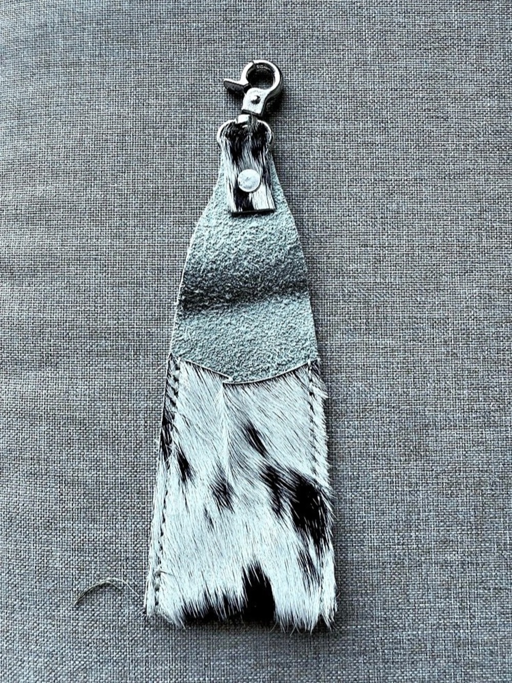 Black and white cowhide chapstick holder keychain
